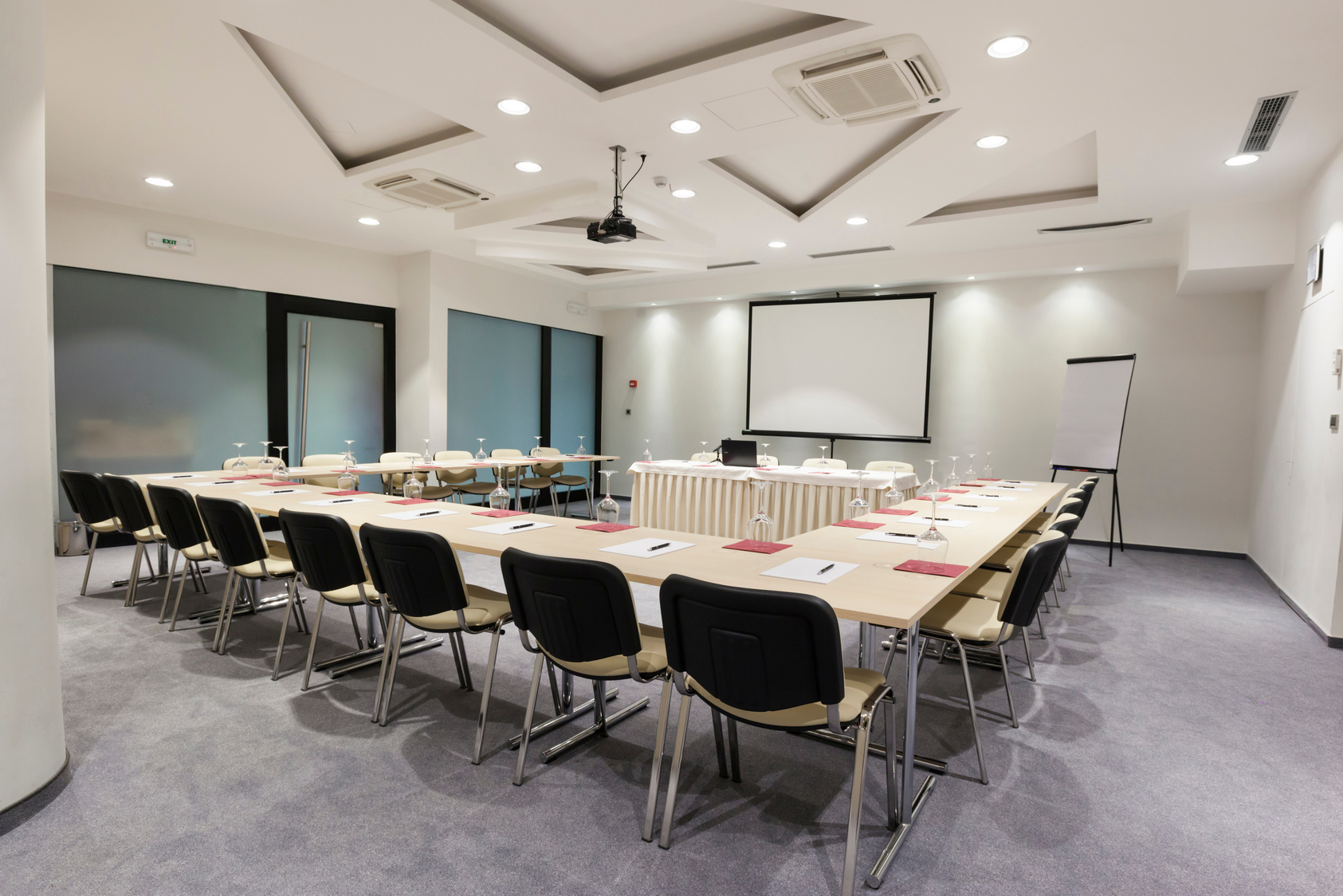 Modern conference room with projection screen